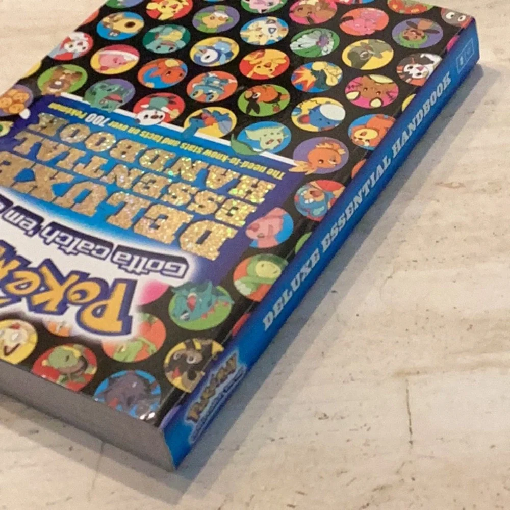 Pokemon Deluxe Essential Handbook Book Stats & Facts Guide 2015 Scholastic